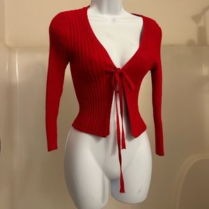 Delia’s red tie sweater